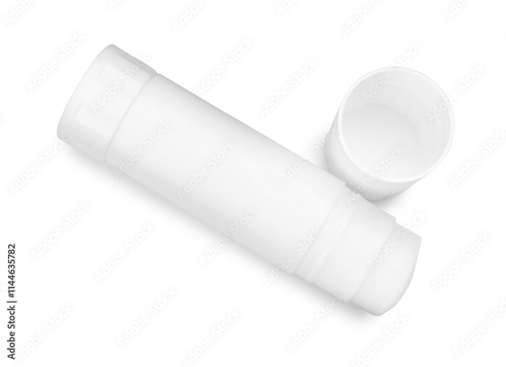 One glue stick and cap isolated on white, top view One glue stick and cap isolated on white, top view