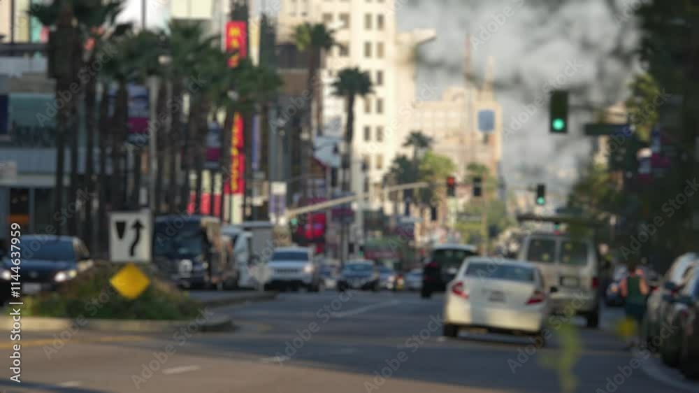 A busy intersection in Los Angeles with historical and modern architecture, bustling with cars and pedestrians in bright sunlight in 4k time lapse A busy intersection in Los Angeles with historical and modern architecture, bustling with cars and pedestrians in bright sunlight in 4k time lapse