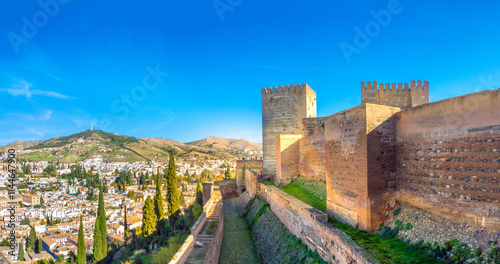 View of the Alcazaba fortress ruins of with the Albaicin neighborhood of Granada in the background, the Alhambra, Granada, Andalusia, Spain