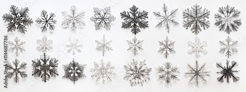Beautiful snowflakes on a white background. Selective focus.