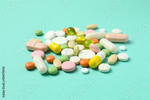 Various pills on color background