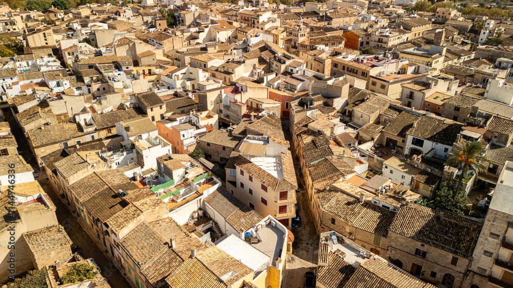Fototapeta premium The houses of the city of Alcudia, Majorca, Spain. Aerial photography.
