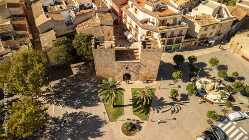 Porta del Moll or de Xara, the nothern gate in the medieval city of Alcudia, Majorca, Spain.  photo