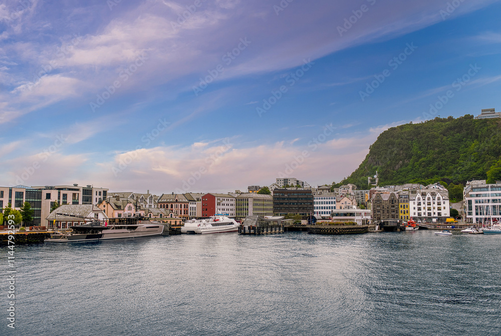 Fototapeta premium Alesund is a city and municipality in Møre og Romsdal county, Norway. It is a port 236 km northeast of Bergen