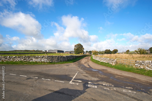 Road junction on a country lane in Wetton, Staffordshire, UK photo