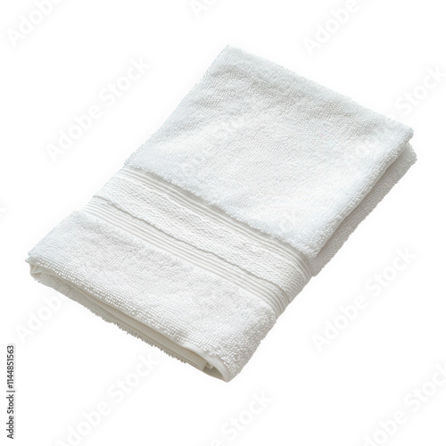 A neatly folded white bath towel isolated on black