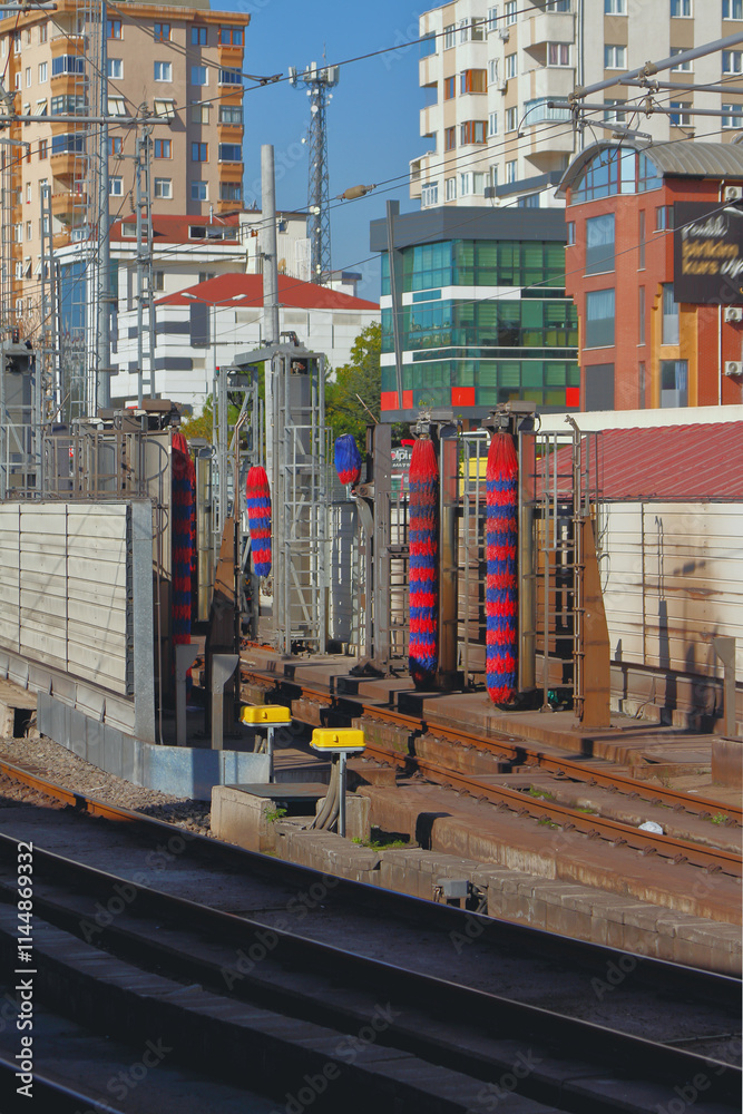 Washing railway cars in city. Pendik, Istanbul, Turkey