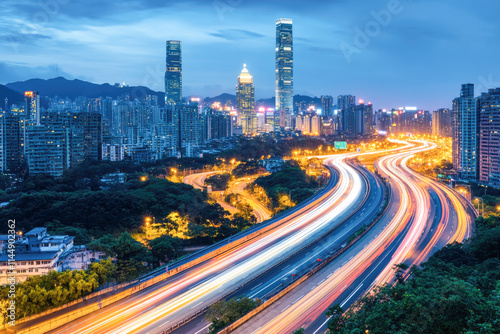 Night city skyline with light trails and skyscrapers