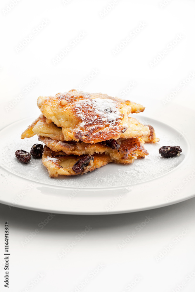 Kaiserschmarrn, Emperor's Mess, lightly sweetened pancake, sweet dessert Kaiserschmarrn, Emperor's Mess, lightly sweetened pancake, sweet dessert