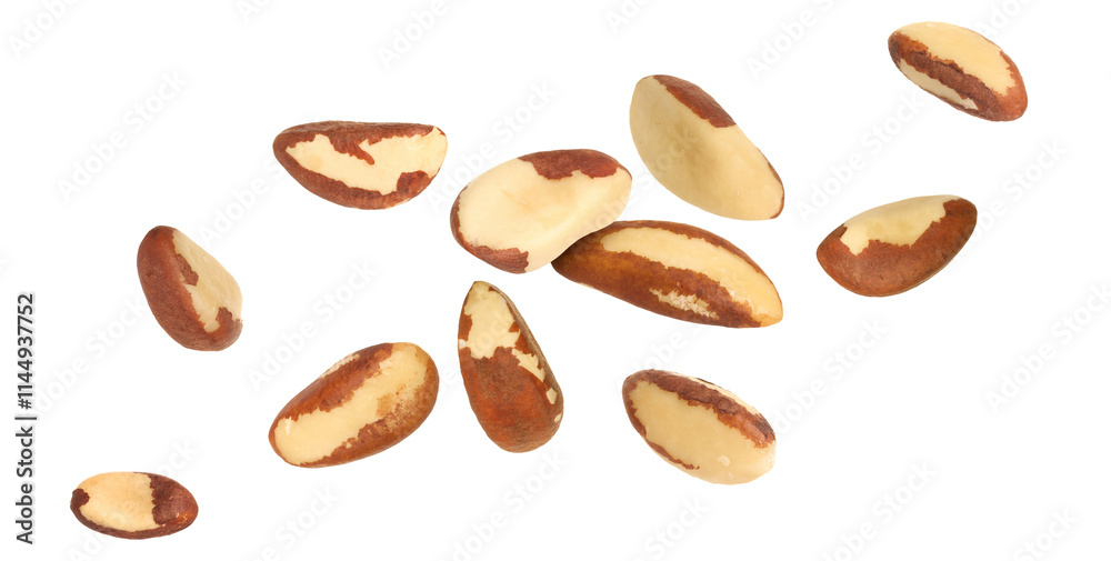 Many Brazil nuts in air on white background Many Brazil nuts in air on white background