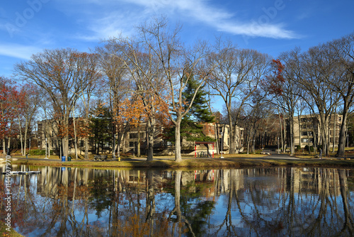 Stony Brook University (SBU), public research university in Stony Brook, New York area, United States, on Long Island. Picturesque autumn nature with pond