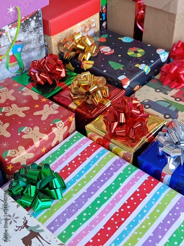 Christmas gifts wrapped with decorative paper and bows, gift concept