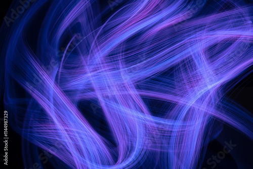 Intertwining lines of light on a black background