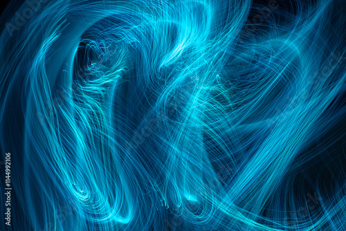 Intertwining lines of light on a black background