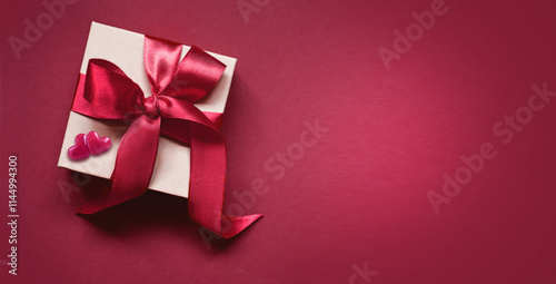 White paper box isolated on red background, valentines day, copy space for text