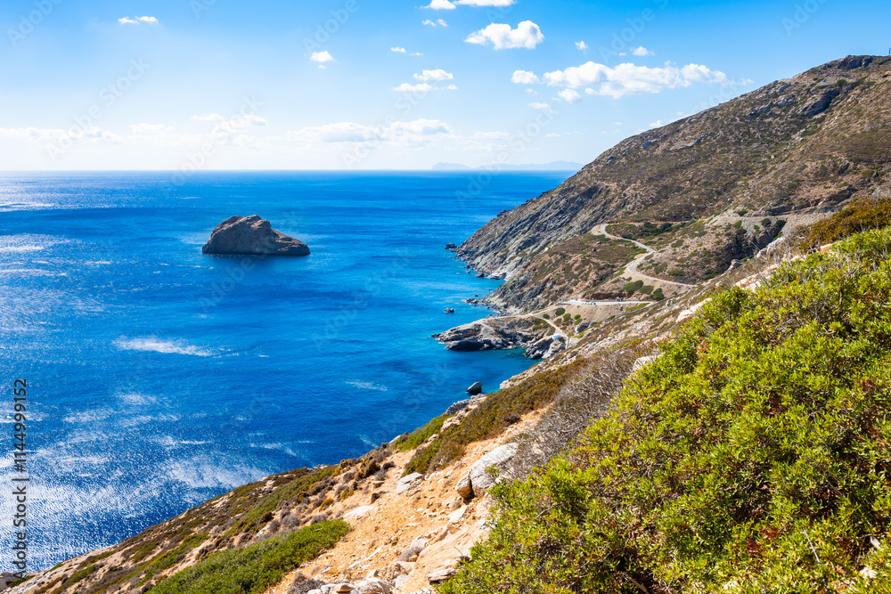 Walking path along sea and high cliffs to Panagia Hozoviotissa monastery, Amorgos island, Cyclades, Greece