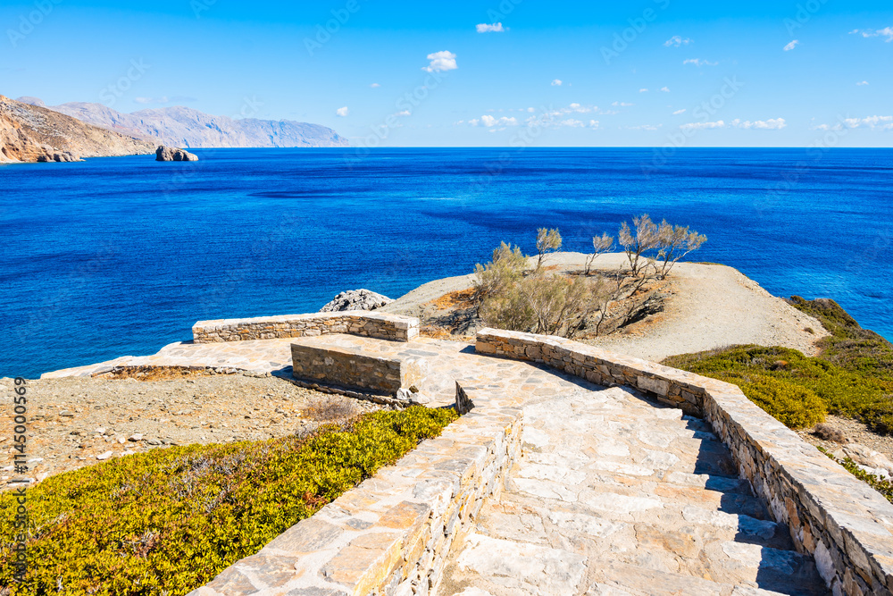Walking path to small Greek chapel near Agia Anna beach, Amorgos island, Cyclades, Greece