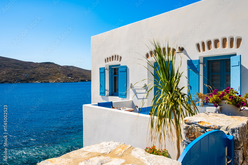 Typical Greek style apartments on sea coast in Katapola village, Amorgos island, Cyclades, Greece