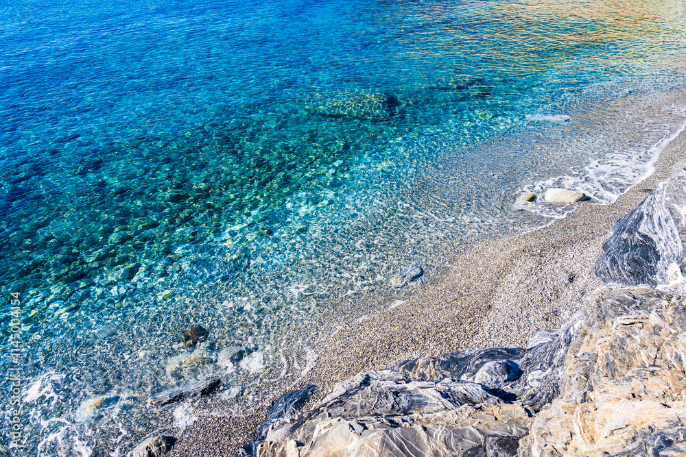 Mouros beach with crystal clear azure sea water, Amorgos island, Cyclades, Greece