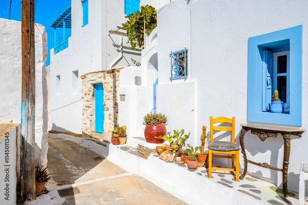 Narrow alley in Tholaria village with typical Greek architecture, Amorgos island, Cyclades, Greece