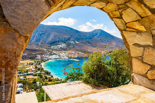 Obraz na płótnie View of Aigiali sea bay with mountains framed by stone arch, Amorgos island, Cyclades, Greece w salonie