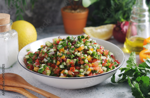 A bowl with traditional Israeli Salad