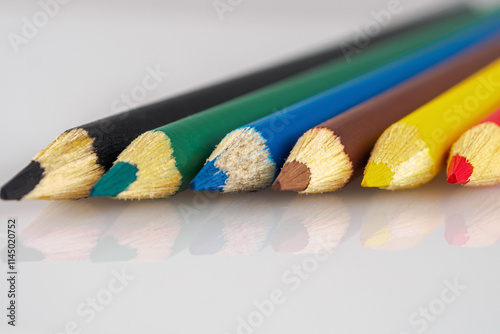 A macro shot of colored pencils showing the vibrant hues and details that inspire creativity and the art of drawing photo