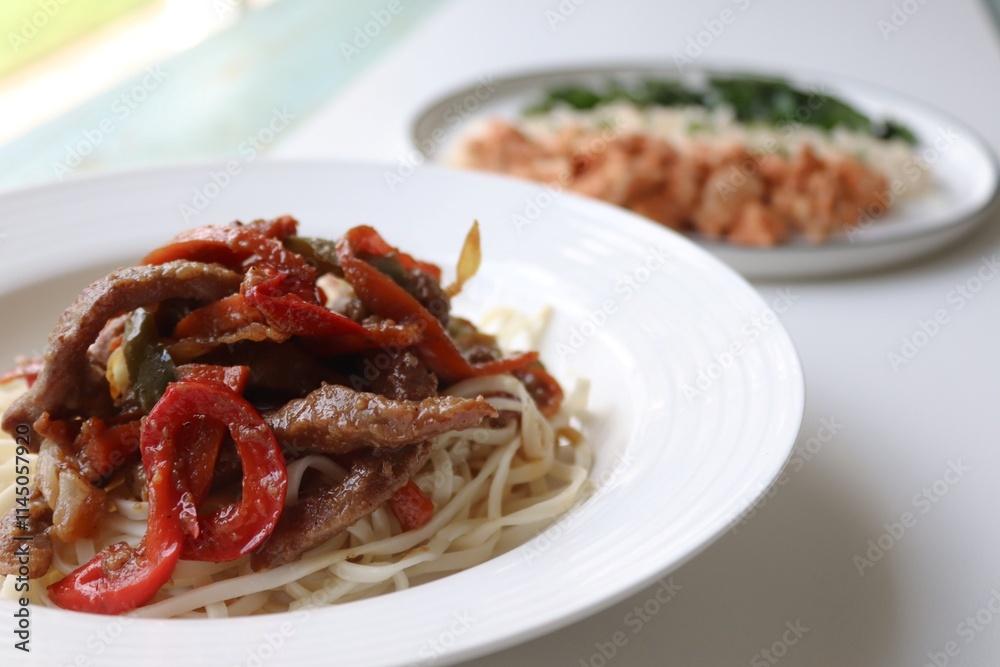 Photography of homemade plated meals. Ranging from rice dishes to wraps to chicken to pasta. Photography of homemade plated meals. Ranging from rice dishes to wraps to chicken to pasta.
