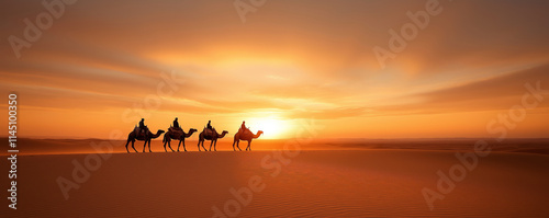 Bedouins riding camels during sunset in Sahara Desert, creating a scenic view of traditional desert travel against a vibrant orange sky