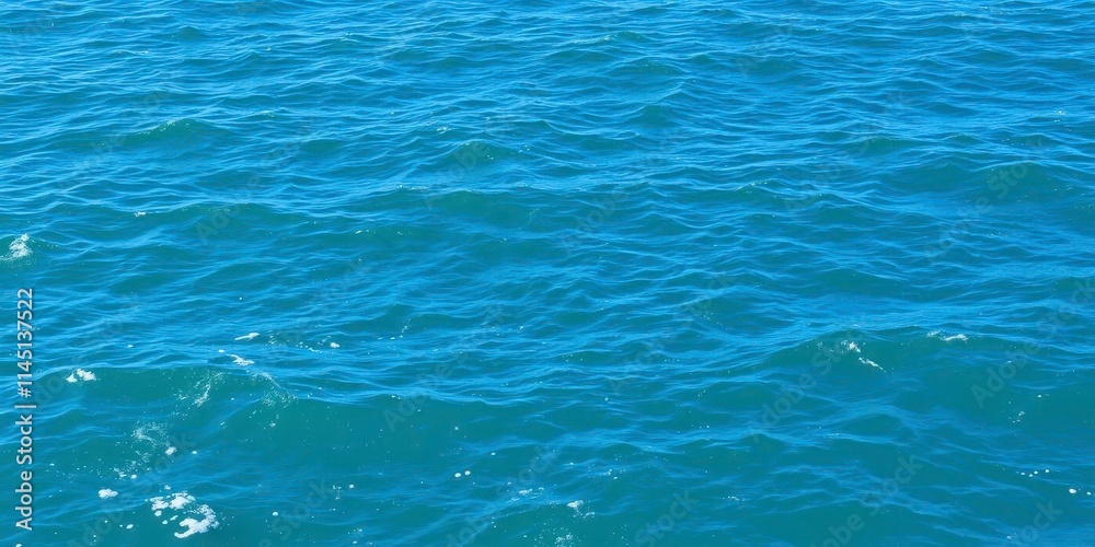 Pure blue turquoise water texture with foamy waves crashing, sea, peaceful Pure blue turquoise water texture with foamy waves crashing, sea, peaceful