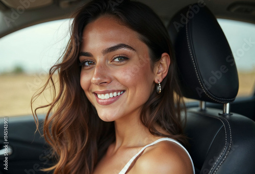 Close-up portrait of her she nice-looking attractive lovely brunette charming glad cheerful cheery girl riding new car enjoying having fun listening music singing pop rock photo