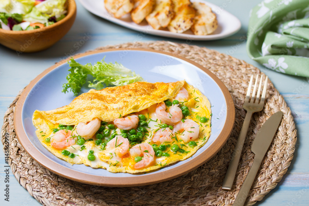 Prawn omelette with peas. Eggs with shrimps Prawn omelette with peas. Eggs with shrimps