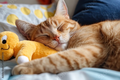 A relaxed ginger cat curls up comfortably with a yellow toy bear, radiating peace and joy, and lying on a dotted-patterned bedcover that enhances the cozy vibe.