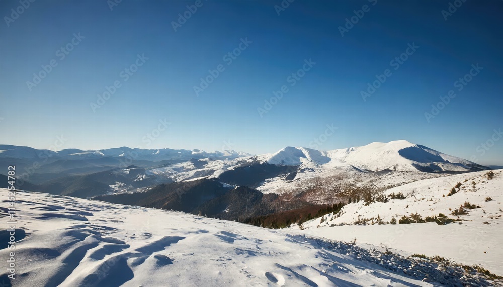 Breathtaking Wide Angle View of Majestic White Snowy Mountain Range Under a Clear Blue Sky During a Cold Winter Day Natures Winter Wonderland Captured in Stunning Detail Breathtaking Wide Angle View of Majestic White Snowy Mountain Range Under a Clear Blue Sky During a Cold Winter Day Natures Winter Wonderland Captured in Stunning Detail