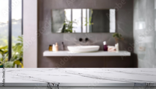 Empty white marble table in front of blurred bathroom interior