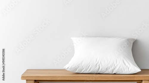 A beautifully styled eiderdown pillow rests on a reclaimed wood table showcasing its eco-friendly qualities. Warm neutral tones highlight the natural textures of fabric and wood