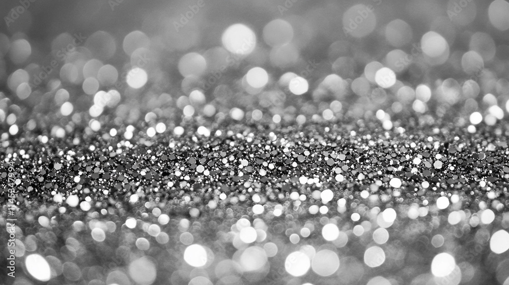 gray monotone grain texture with glittering sand creates a chaotic and abstract backdrop, symbolizing tension, uncertainty, and the randomness of life, conveying a sense of unpredictability