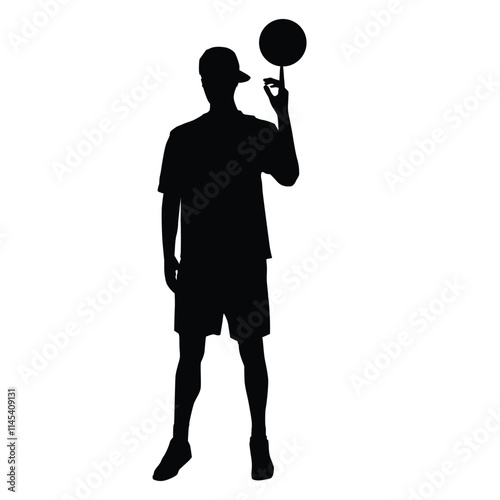  Silhouette of a basketball player spinning the ball on the finger