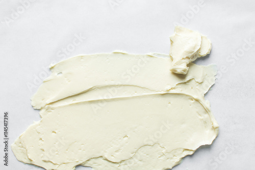 silky smooth american buttercream on a marble surface,Top view of buttercream for decorating cake, overhead view of smooth buttercream photo