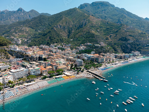 Aerial View of Maiori Beach on the Amalfi Coast - Vibrant Italian Summer Scene with Sunbathers, Boats, and Crystal-Clear Mediterranean Waters in a Stunning Coastal Destination