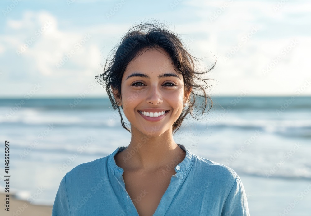 Happy young woman with natural beauty smiles brightly at the beach, exuding joy and confidence during a sunny day by the ocean with gentle waves in the background. Happy young woman with natural beauty smiles brightly at the beach, exuding joy and confidence during a sunny day by the ocean with gentle waves in the background.