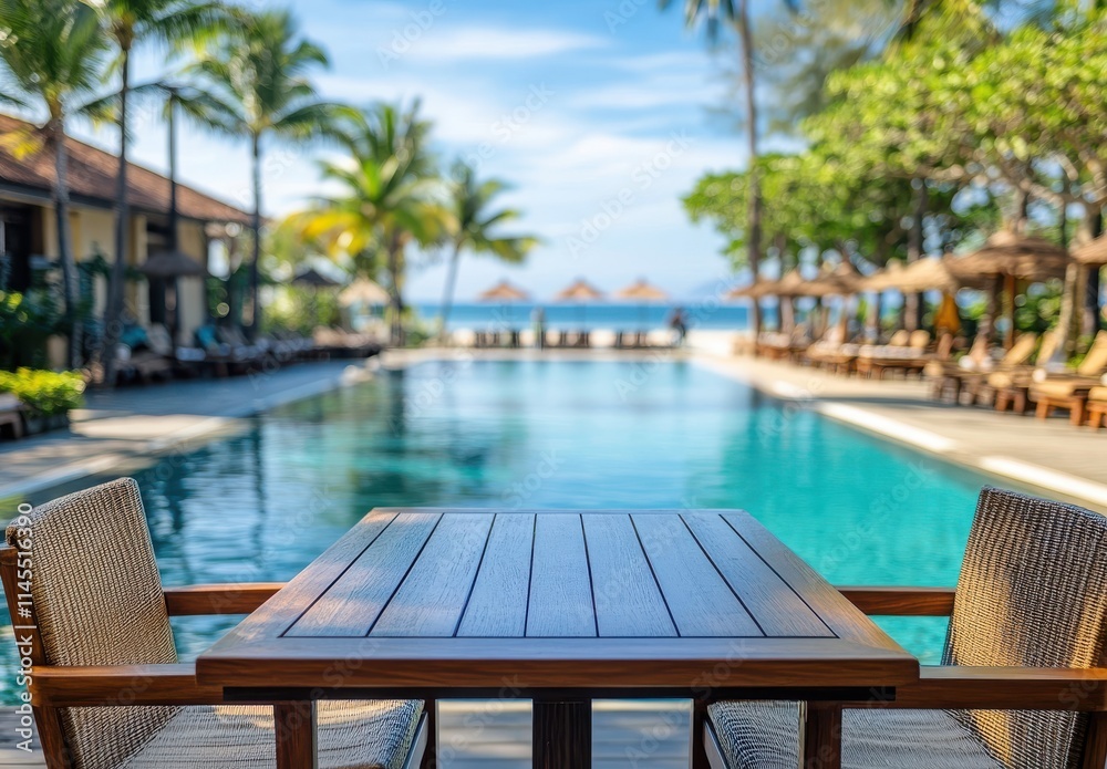 Serene Tropical Poolside View with Wooden Table and Chairs Surrounded by Lush Greenery and Palm Trees in a Luxurious Resort Setting Serene Tropical Poolside View with Wooden Table and Chairs Surrounded by Lush Greenery and Palm Trees in a Luxurious Resort Setting