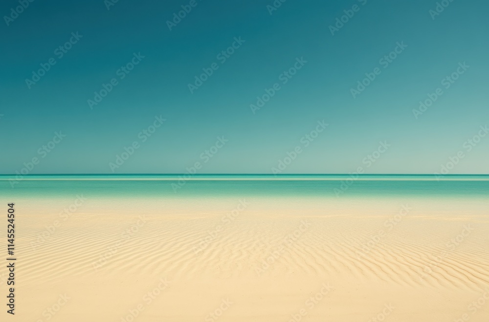 Obraz premium Tranquil Seascape with Serene Blue Waters and Sandy Beach Under a Clear Sky, Perfect for Relaxation, Travel Inspiration, and Nature Imagery