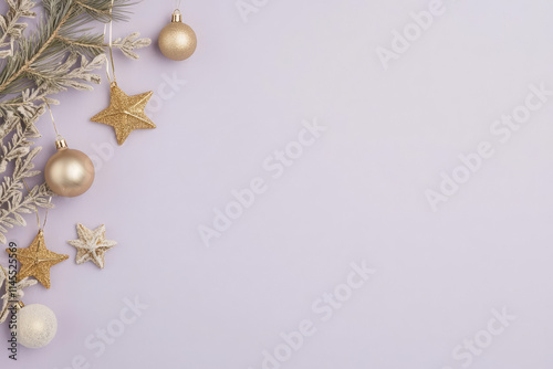 Elegant Christmas decorations with gold ornaments and stars on pastel background photo