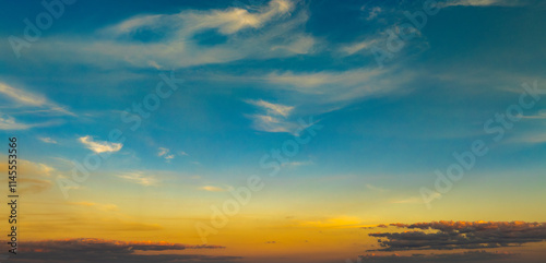 Enjoy a panoramic view of the skyline. The sun rises in the morning sky with colorful clouds. and beautiful cloud patterns In the soft light of the morning	