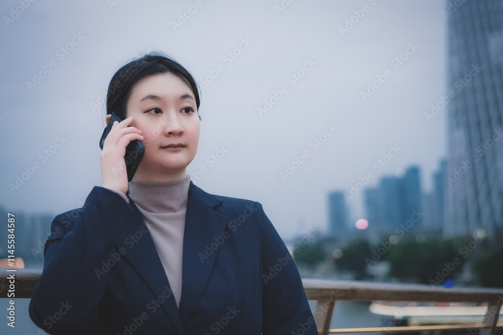 Professional Woman Engaged in Business Conversation in Urban Setting Professional Woman Engaged in Business Conversation in Urban Setting