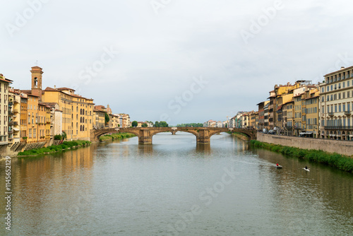 Florence, Italy. Ponte Santa Trinita - Graceful bridge with 3 arches designed by Bartolomeo Ammanati. Summer day photo