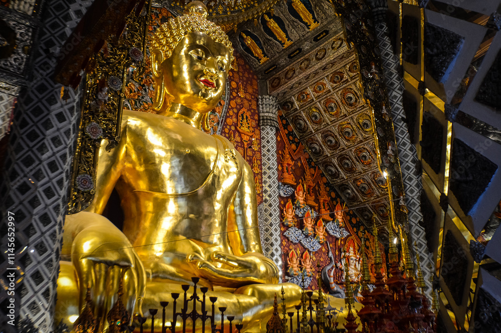 Fototapeta premium Golden Buddha, Buddhist symbols at Watsridonmoon, symbols of Buddhism, Southeast Asia at Chiangmai Northern Thailand