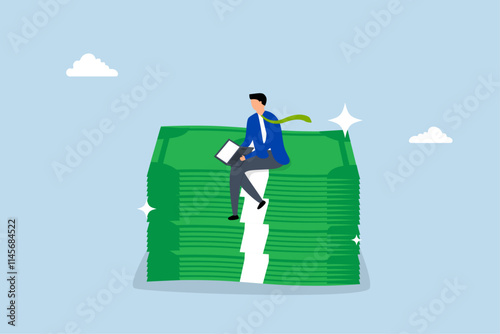 joyful entrepreneur using laptop atop a pile of money stacks. 