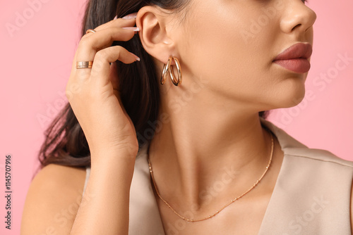 Wallpaper Mural Fashionable young woman in beautiful jewelry on pink background, closeup Torontodigital.ca